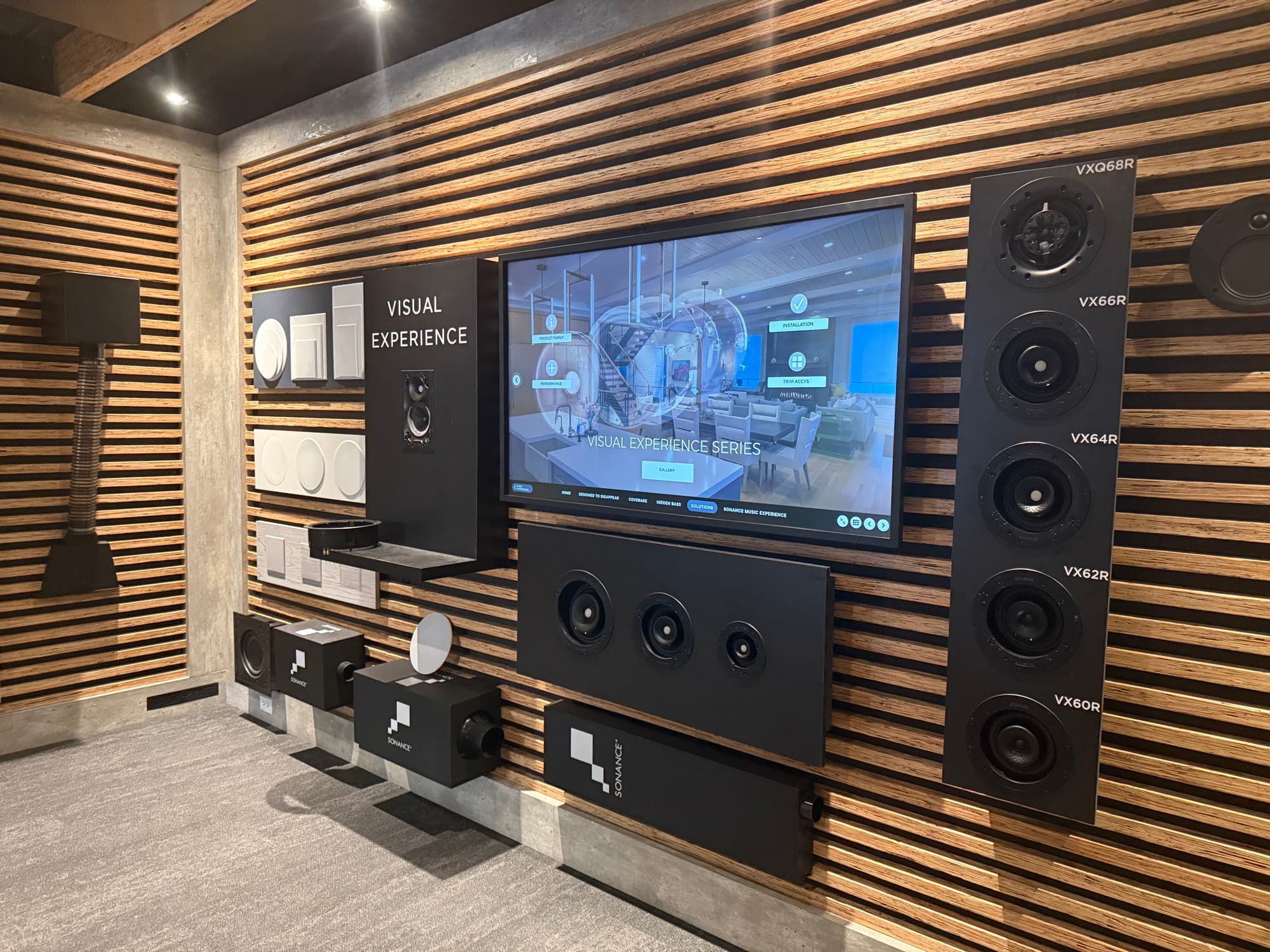 The Visual Experience wall at the Sonance Studio with in-ceiling and in-wall speaker lines