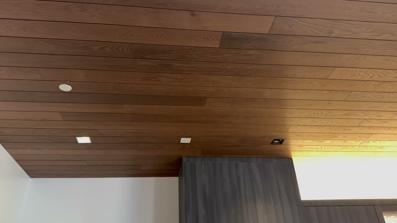 Sonance Small Aperture speakers in a wood ceiling